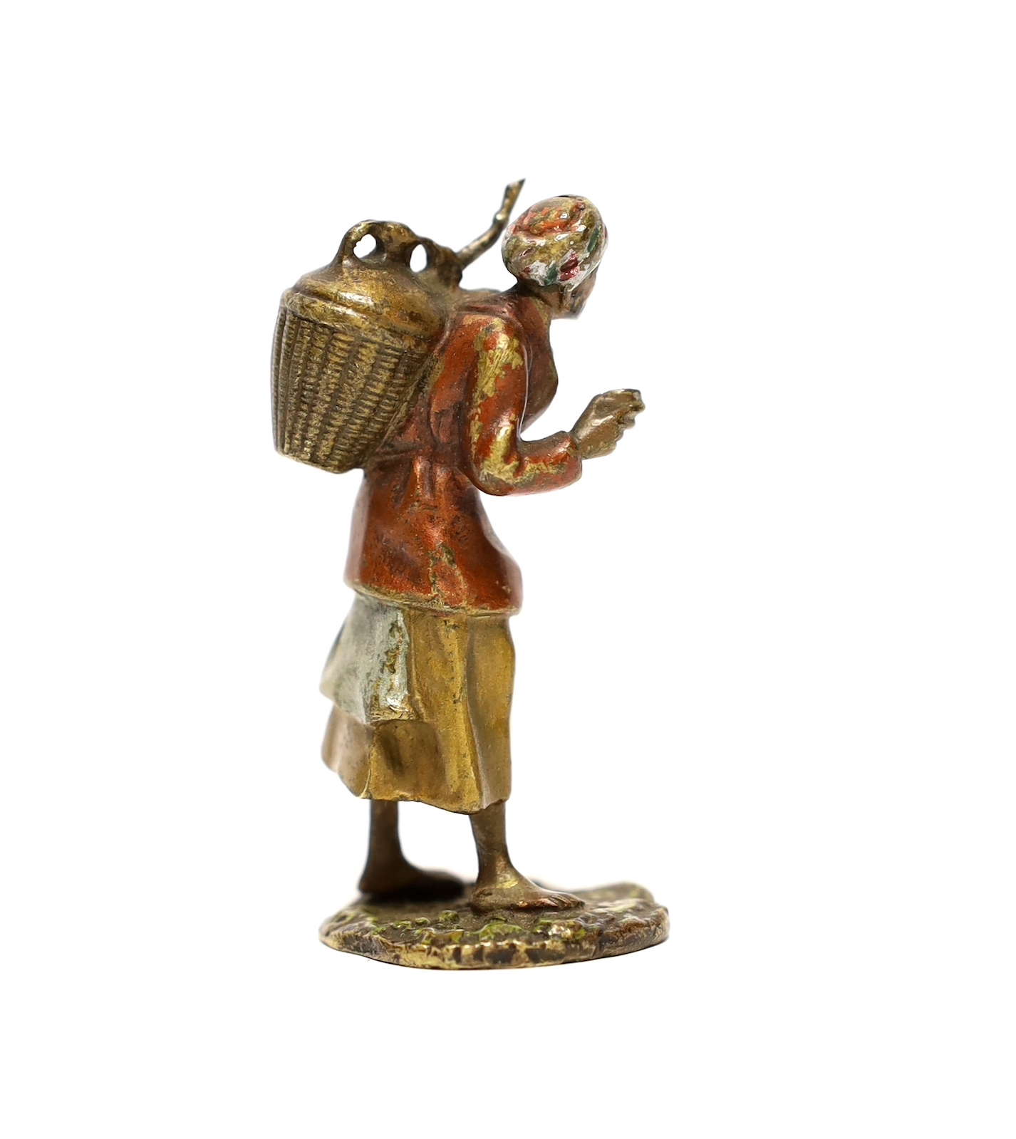 A cold painted bronze figure of an Arab coffee seller, 5.5 cm high